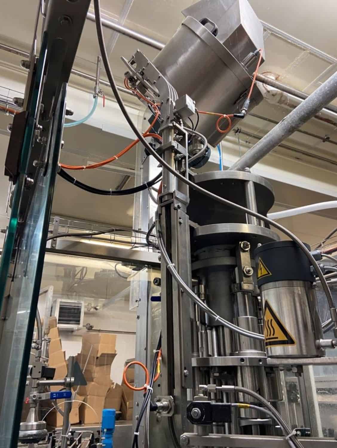 Side view of Nagel, PAC, Juwatec Returnable Glass Filling line for beer, soft drink