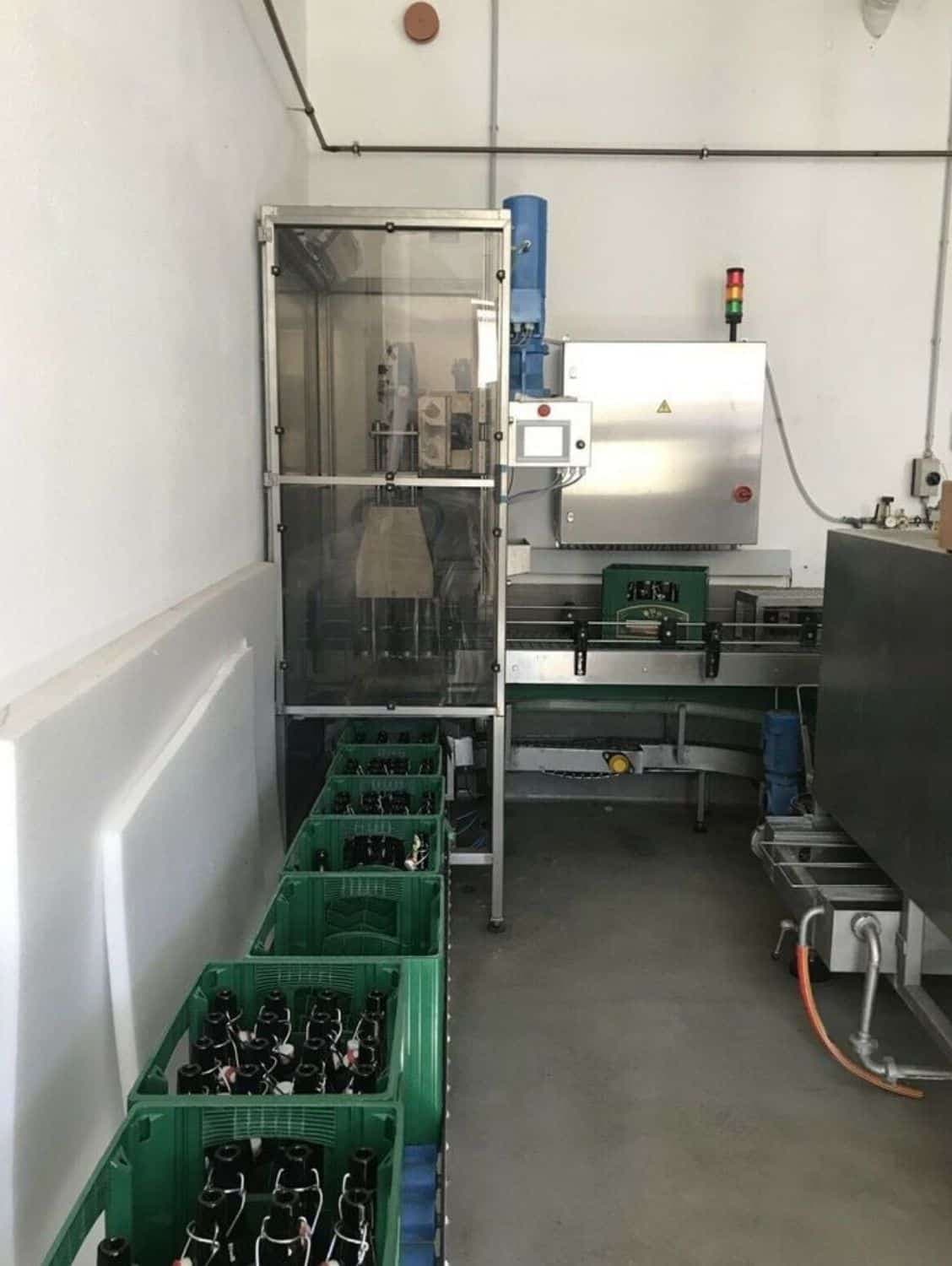 Side view of Nagel, PAC, Juwatec Returnable Glass Filling line for beer, soft drink