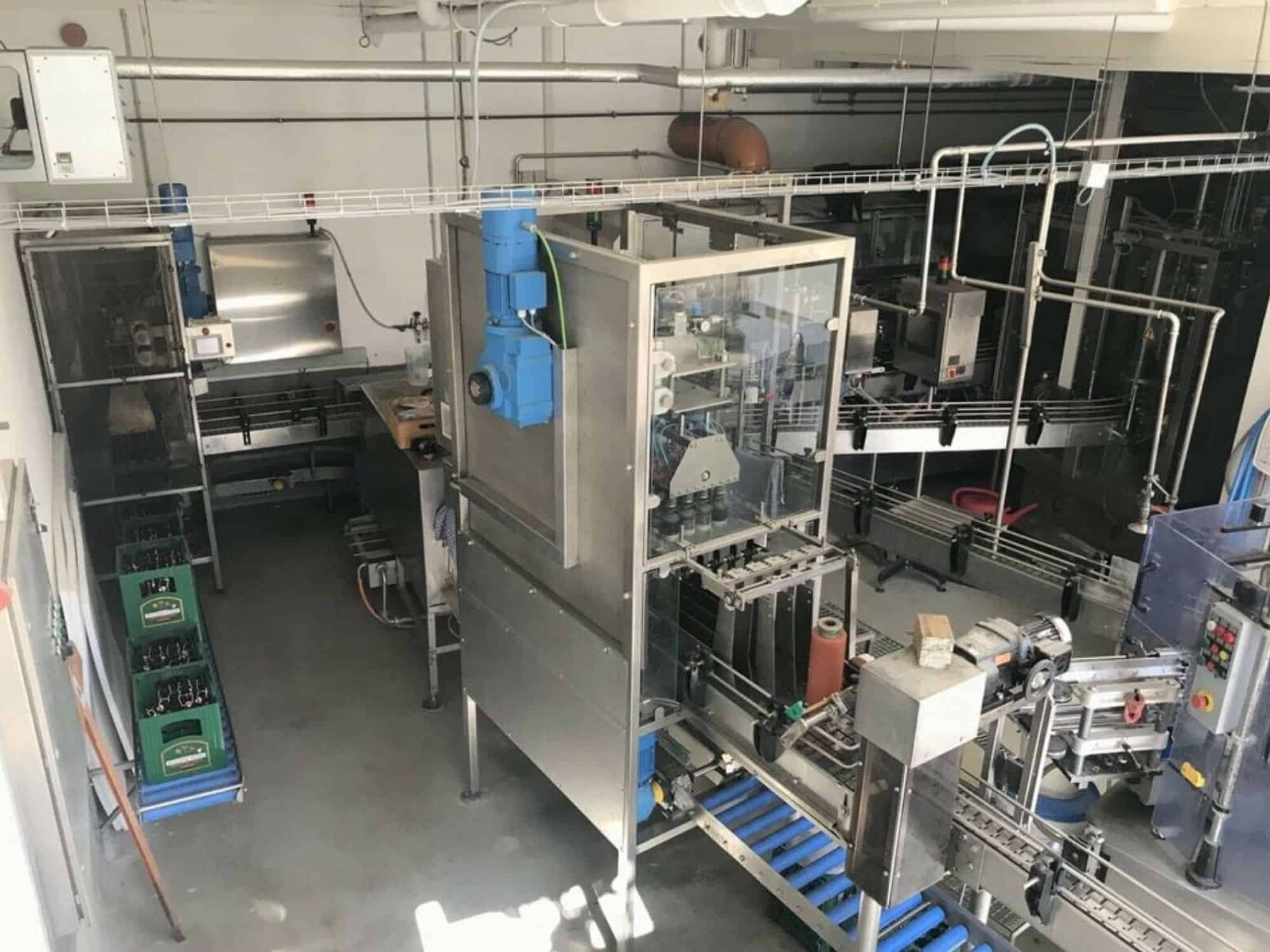 Side view of Nagel, PAC, Juwatec Returnable Glass Filling line for beer, soft drink