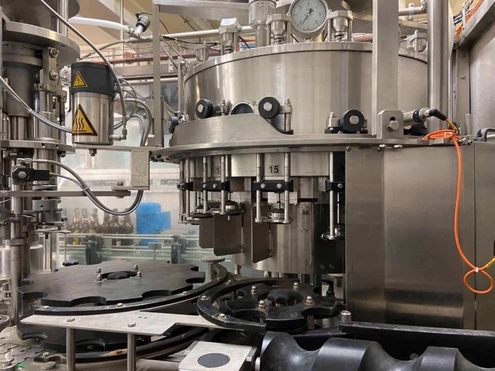 Side view of Nagel, PAC, Juwatec Returnable Glass Filling line for beer, soft drink
