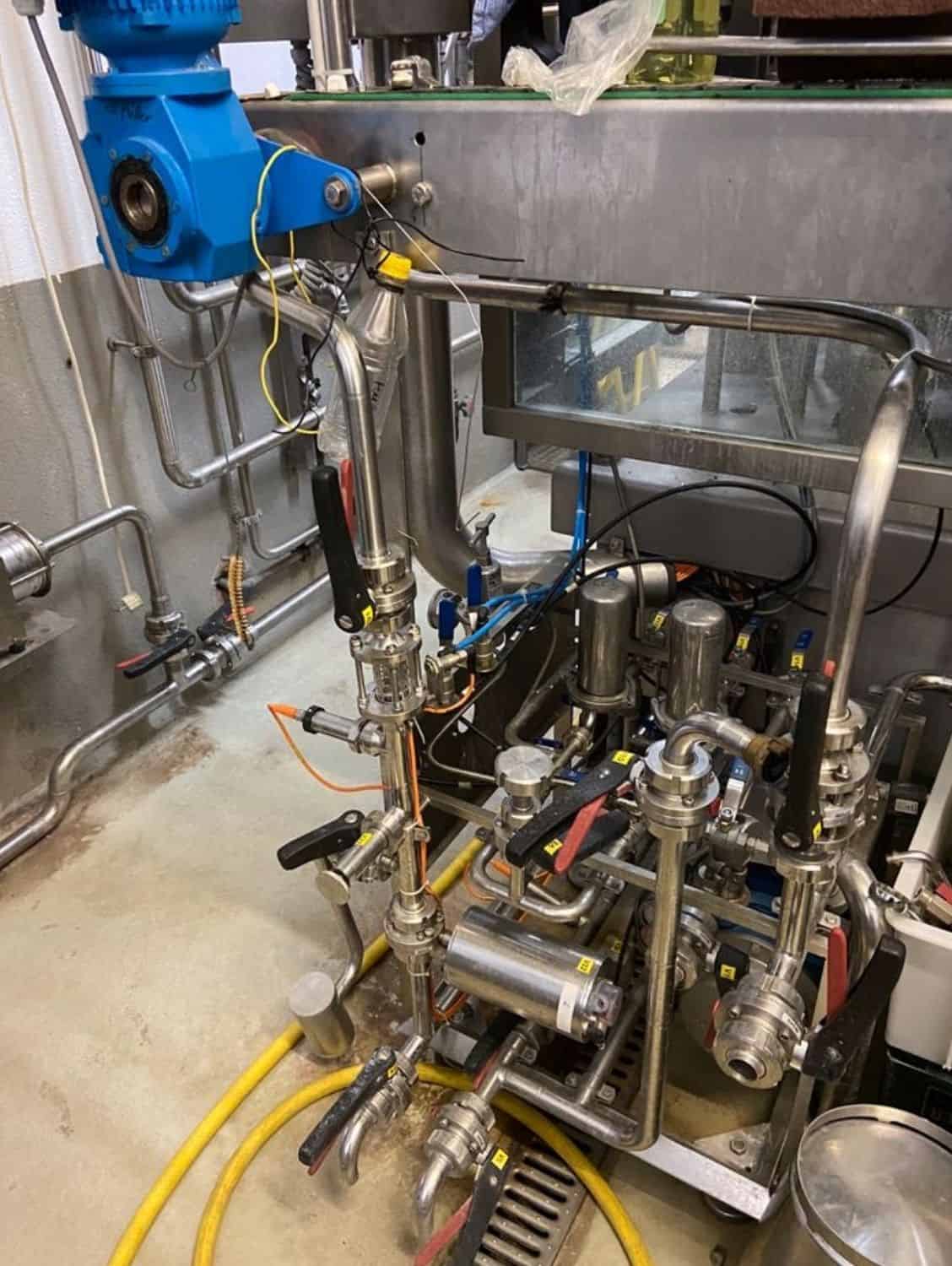 Side view of Nagel, PAC, Juwatec Returnable Glass Filling line for beer, soft drink