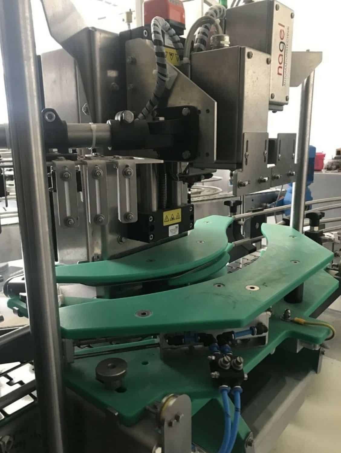 Side view of Nagel, PAC, Juwatec Returnable Glass Filling line for beer, soft drink