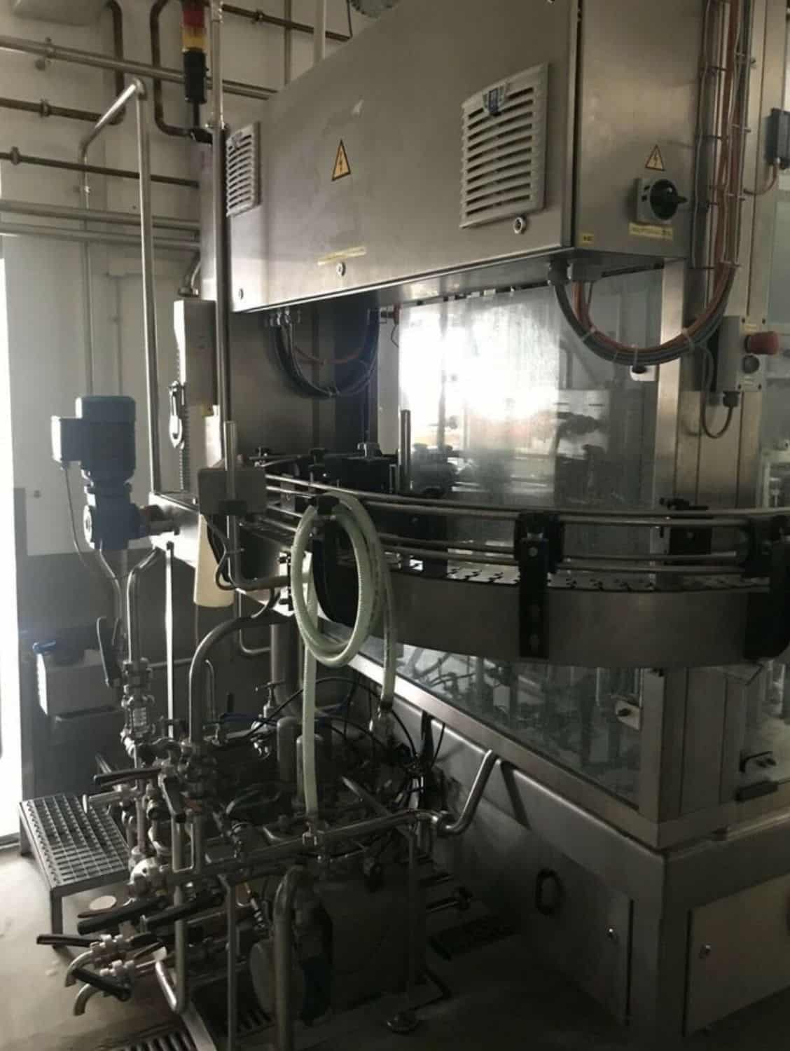 Left view of Nagel, PAC, Juwatec Returnable Glass Filling line for beer, soft drink